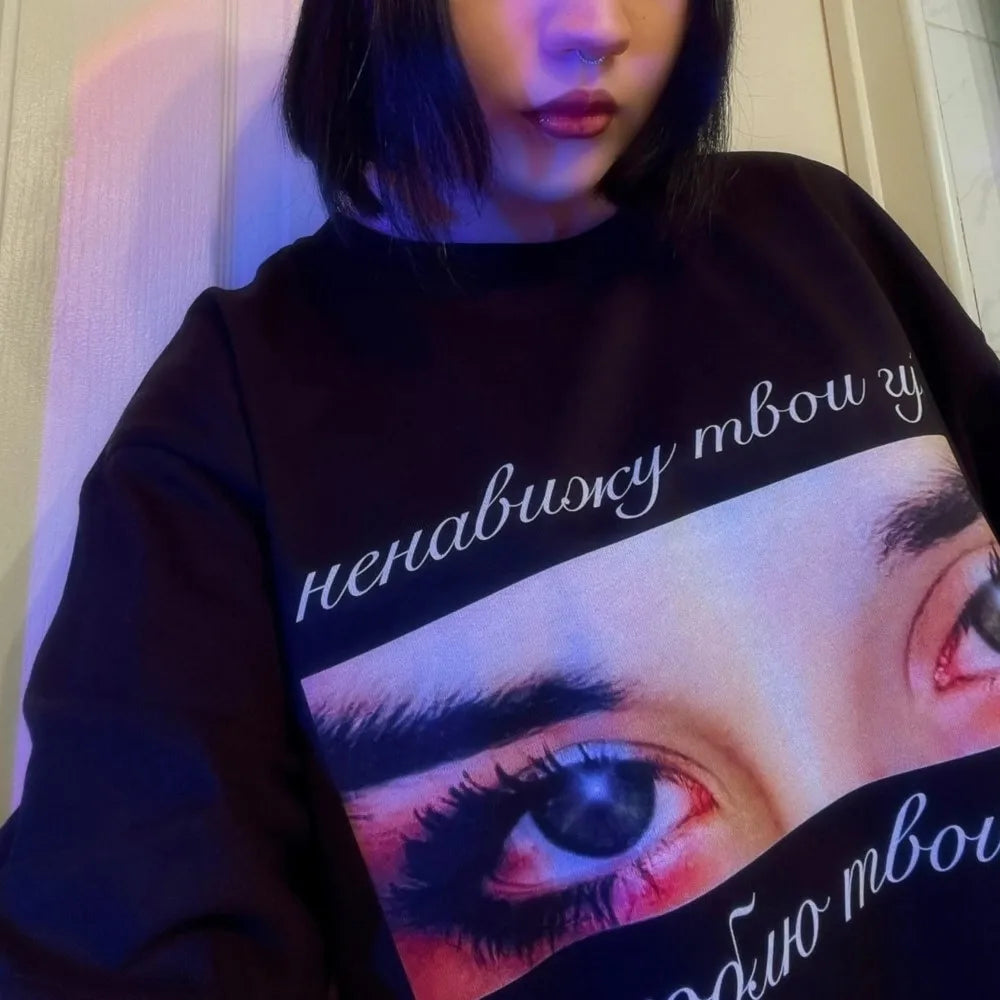 Black harajuku oversized streetwear pullover with eye graphic and cyrillic text for goth y2k winter hip hop aesthetic style