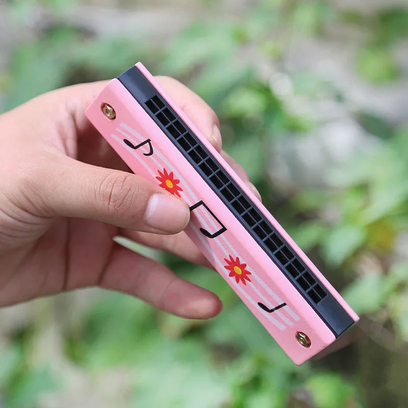 Pink harmonica toy with red flower and black musical note decals educational musical instrument for preschool children beginner