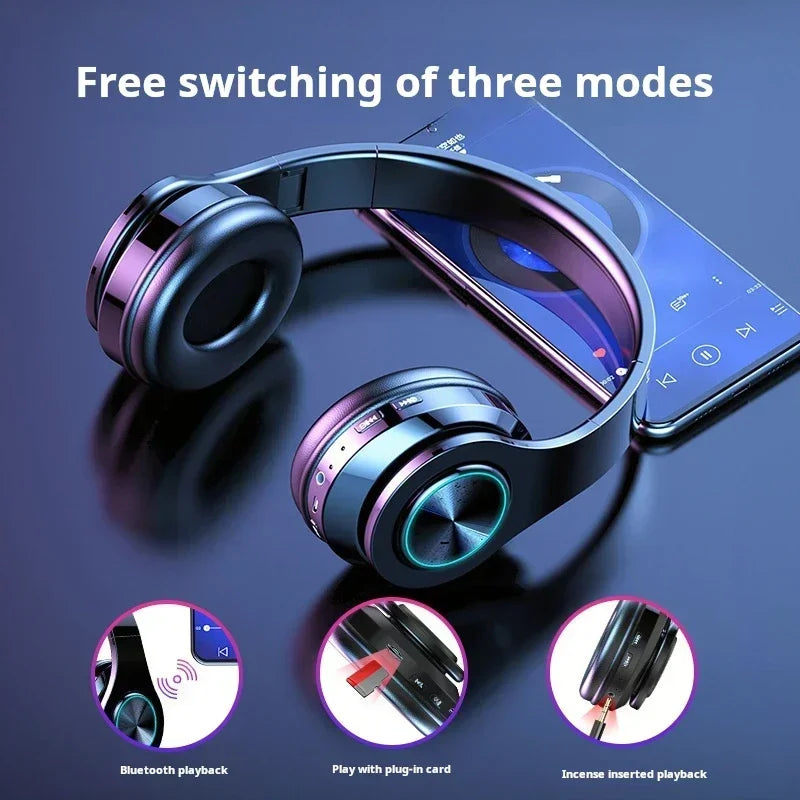 Black and purple gaming headphones blutooth with glowing blue accents and micro phone colourful wireless surround sound design