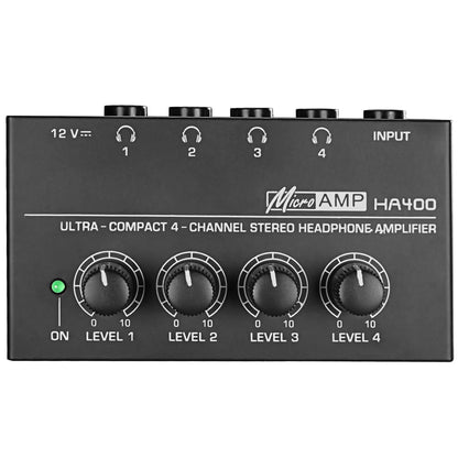 Black microamp ha400 ultra-compact stereo headphone amplifier with four volume knobs and 6.35mm jack inputs