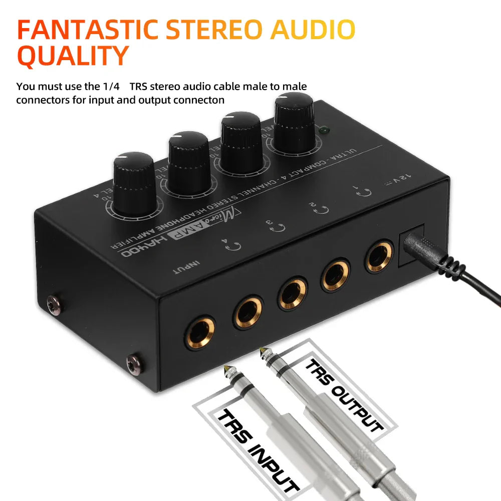 Black ultra-compact stereo headphone amplifier with four black knobs and gold 6.35mm 35mm jack for audio control