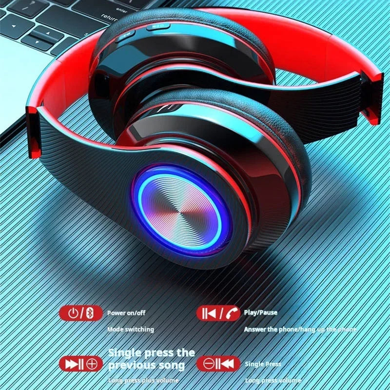 Red and black headsets gamer headphones with glowing blue microphone colourful light and wireless bluetooth surround sound