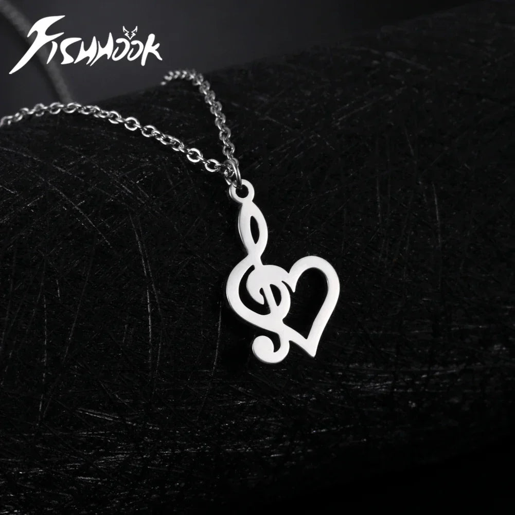 Silver-toned stainless steel heart music note necklace featuring a delicate cut-out treble clef design gift for all ages