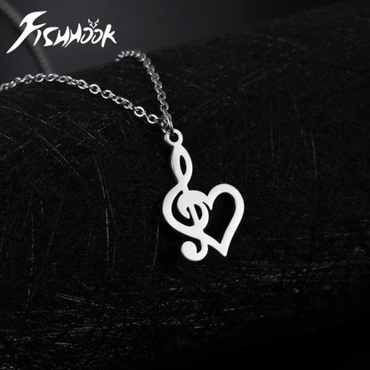 Silver-toned stainless steel heart music note necklace featuring a delicate cut-out treble clef design gift for all ages