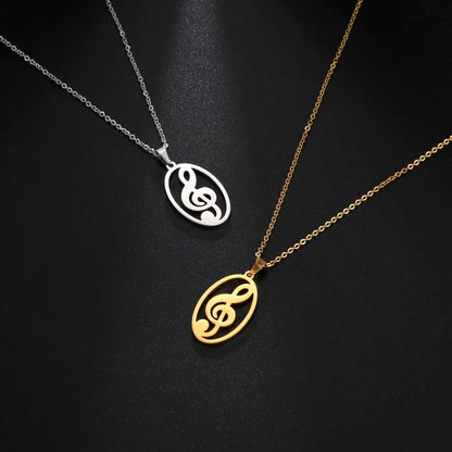 Two elegant oval stainless steel note treble necklaces in silver and gold featuring a delicate heart music note design