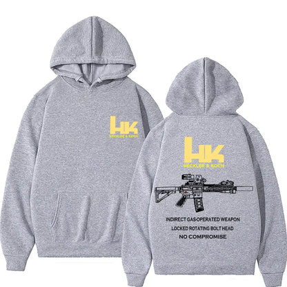 Gray heathered hoodie with yellow heckler and koch logo front and fashion m4 gun graphic back pullover streetwear autumn