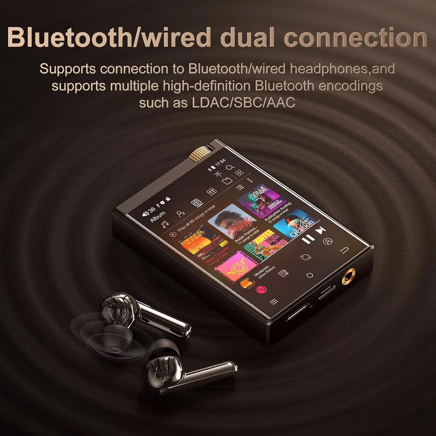 Black rectangular hi-fi mp3 player with gold audio jacks wifi oilsky lossless touchscreen and silver wireless earbuds