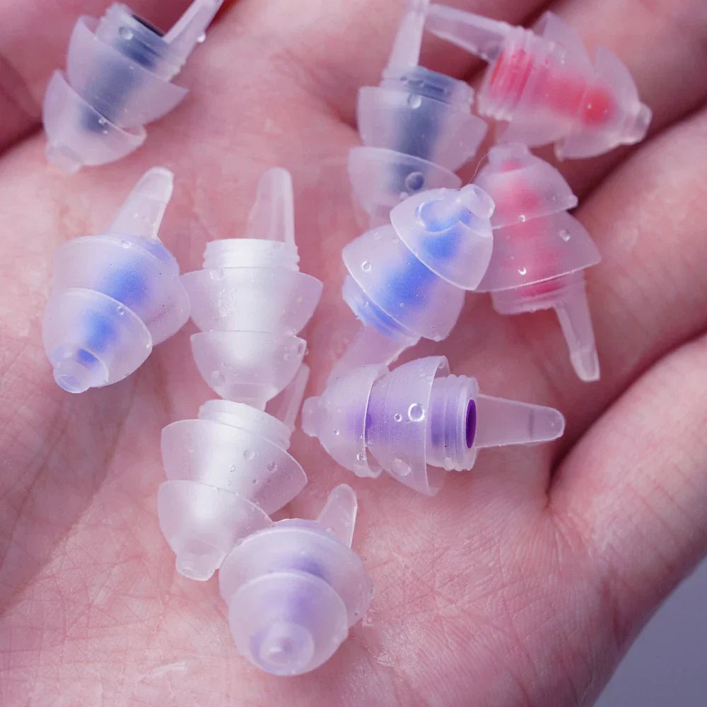 Clear plastic reusable musicians earplugs with blue and purple accents for noise cancelling concert festivals drummers