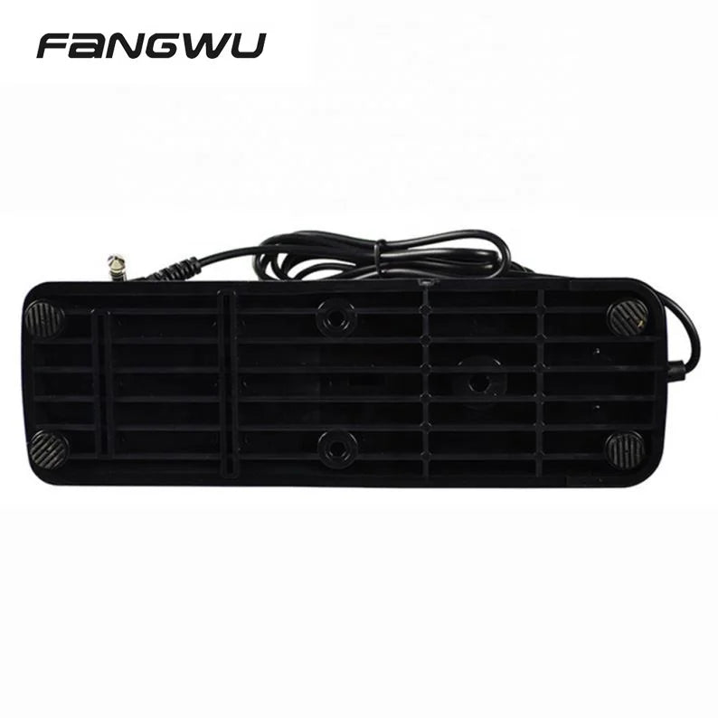 Black plastic rearview mirror heater with coiled power cord and textured feet for cherub piano keyboard sustain pedal use