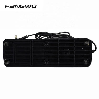 Black plastic rearview mirror heater with coiled power cord and textured feet for cherub piano keyboard sustain pedal use