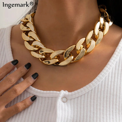 Gold-toned chunky ccb link choker necklace featuring quality exaggerated acrylic and a bold statement hip hop design