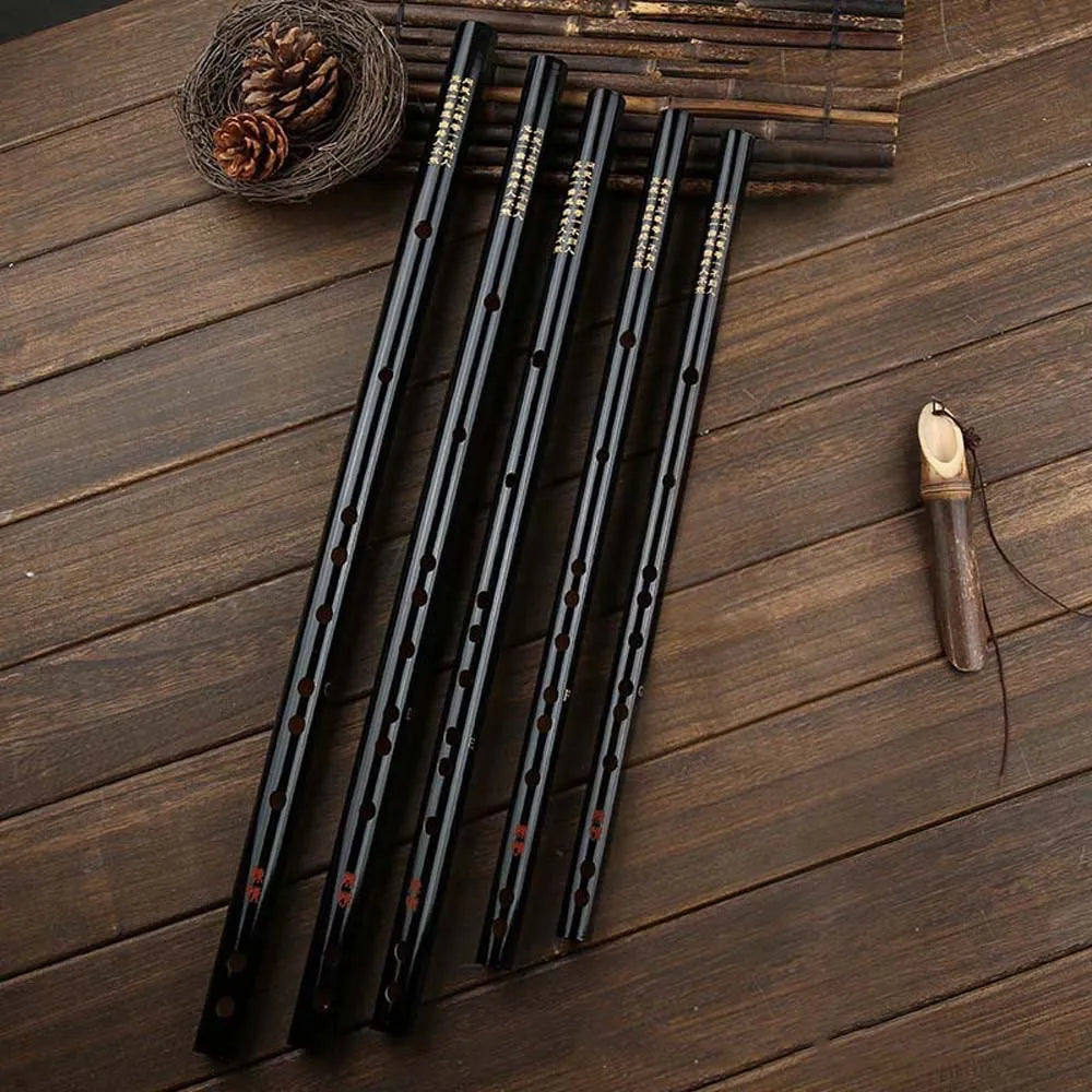 Five black lacquered bamboo dizi flutes with silver keywork and red markings chinese traditional musical instruments
