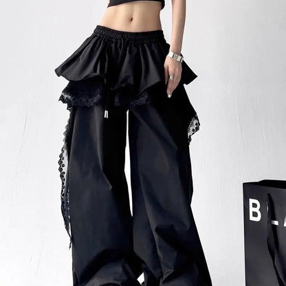 Black ruffled wide-leg pants with lace tiered skirt trim and elastic waistband for sexy women girls hip hop dancewear