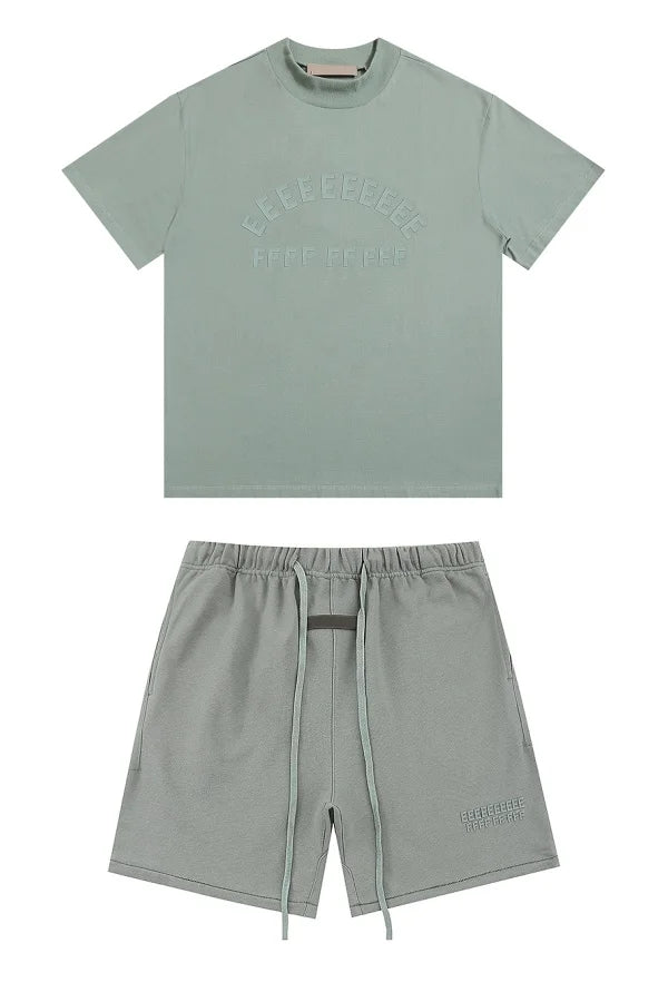 Mint green short-sleeved t-shirt with subtle brand rubberzied logo ideal for shorts sets hiphop and drawstring shorts streetwear
