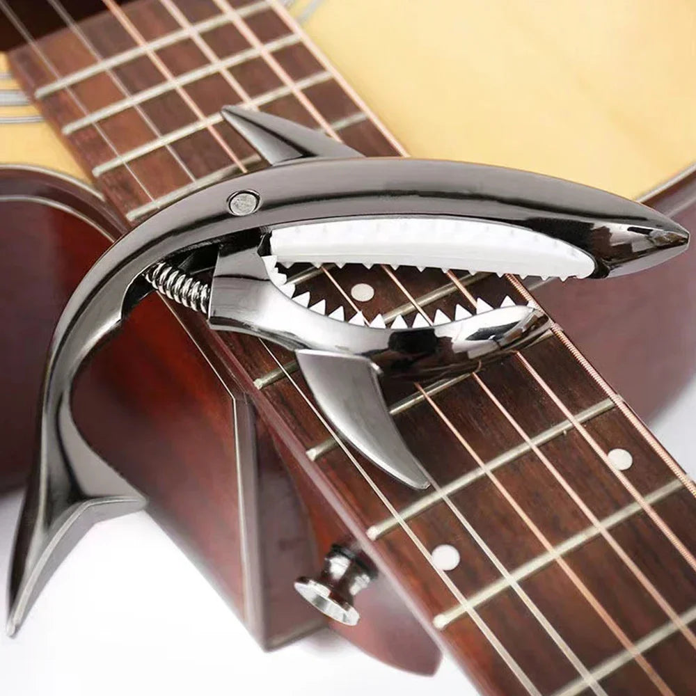 High quality chrome metal shark guitar capo with white teeth and quick change clip for acoustic and electric guitars