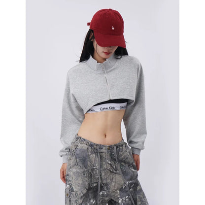 Gray cropped half-zip sweatshirt with ribbed collar and long sleeves made of chemical fiber fabric in hip-hop inspired design