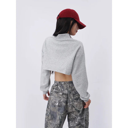 Gray cropped sweatshirt with long sleeves and high neckline made of chemical fiber fabric in hip-hop inspired design