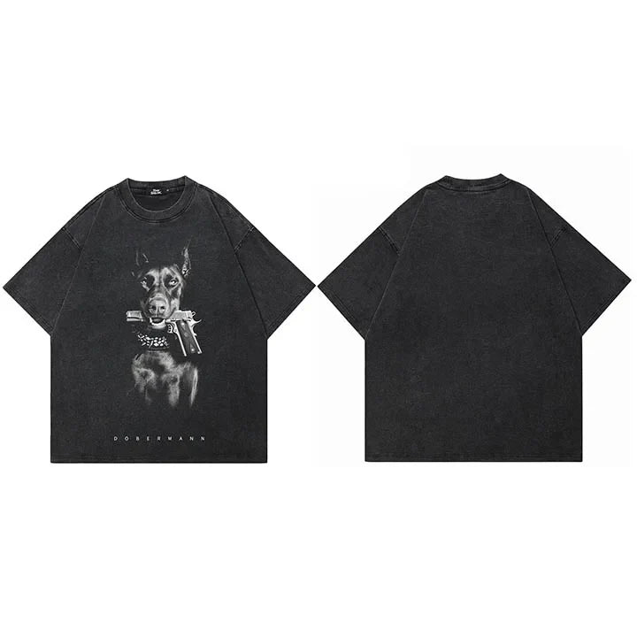 Black vintage washed cotton t-shirt featuring a detailed streetwear doberman dog graphic with pistol and dobermann text