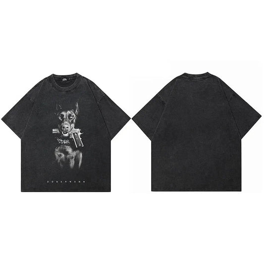 Black vintage washed cotton t-shirt featuring a detailed streetwear doberman dog graphic with pistol and dobermann text