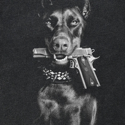 A vintage washed black cotton streetwear doberman dog graphic tee featuring a doberman pinscher with a gun in its mouth