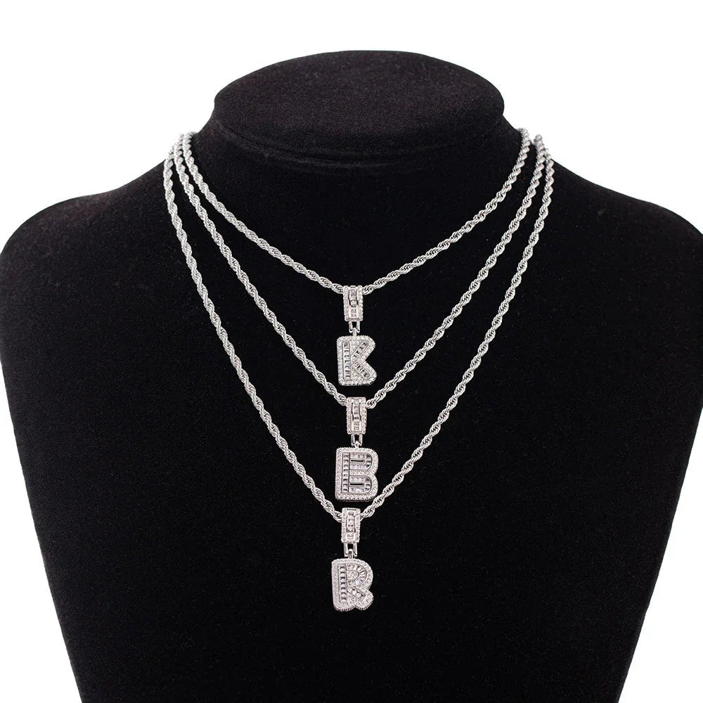 Silver chain wedding jewelry featuring three layered rope-style stone necklaces with pendant white zircon letters k b r