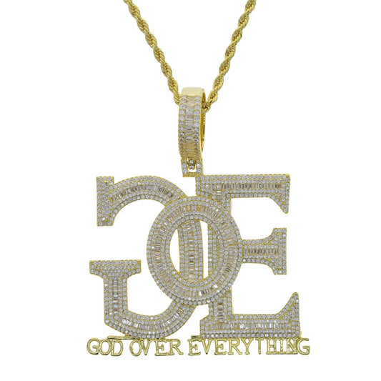 Gold-colored goe letters pendant with diamond-encrusted dc logo and god over everything phrase on gold rope chain men rapper jewelry gold