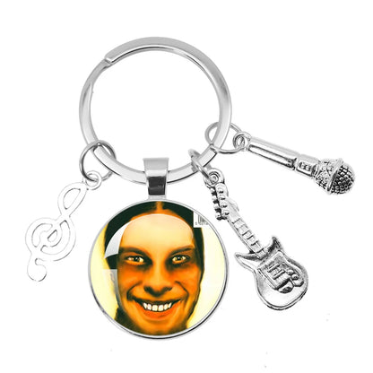 Silver hip-hop themed keychain jewelry with aphex twin logo photo charm and guitar microphone backpack accessories souvenir
