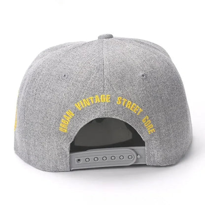 Back view of a gray heathered snapback cap with yellow cotton embroidered lightning text for sports sunshade gorra use