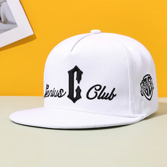 White hip hop baseball cap with black embroidered genius club logo and side emblem, flat eave duckbill street casual design