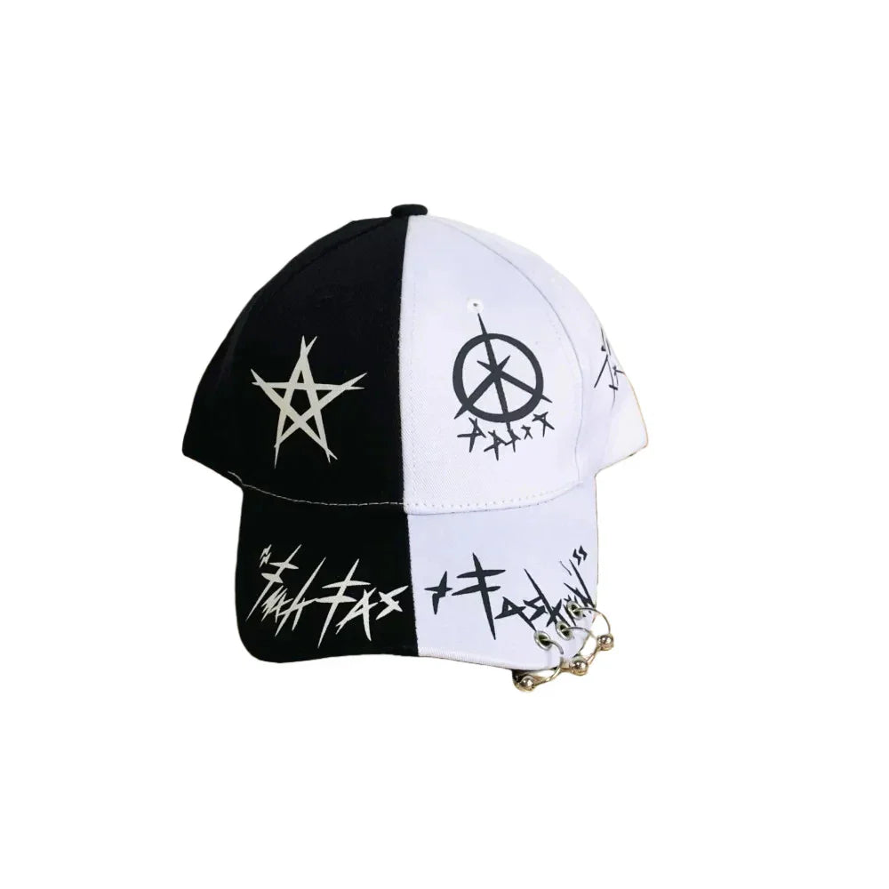 Black and white baseball cap with graffiti color-block pattern featuring silver star and anarchist symbol, fashionable streetwear accessory