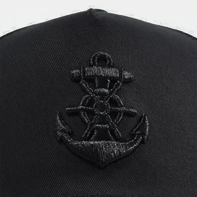 Black embroidered anchor patch on a black cotton hip hop baseball cap for men and women outdoor sun hat