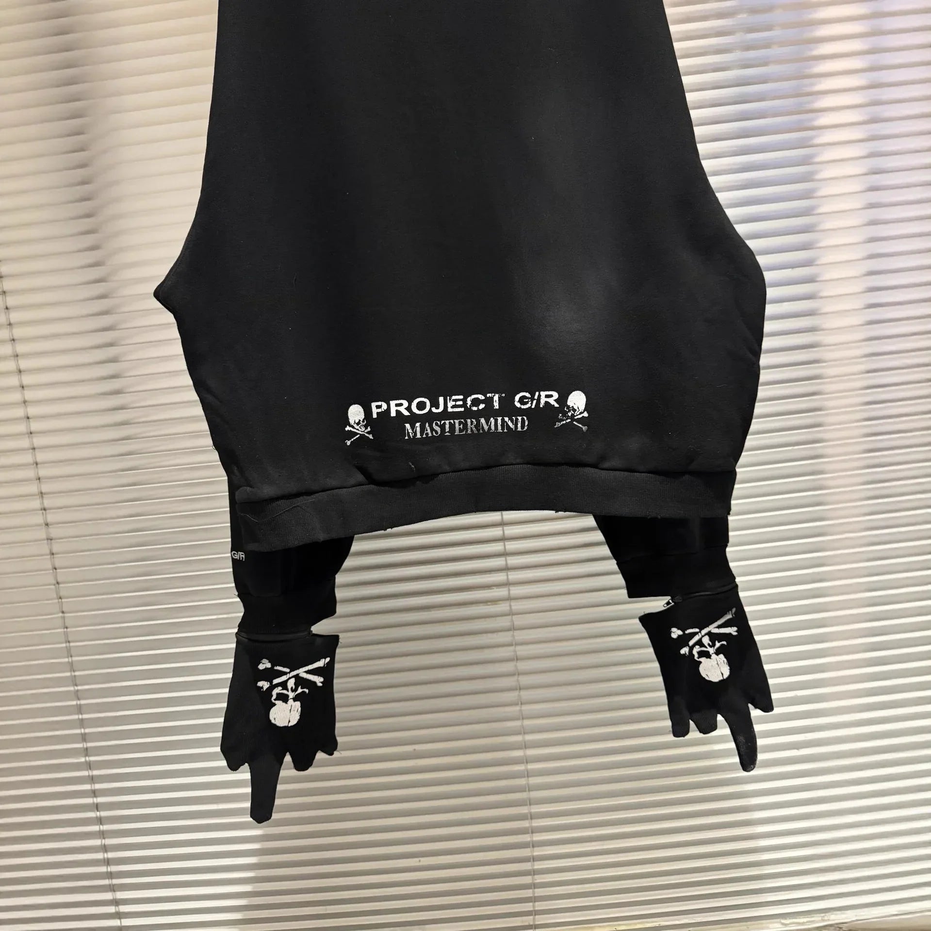 Black project g/r sleeveless top with white skull embroidery and matching gloves in hip hop bird graphics style