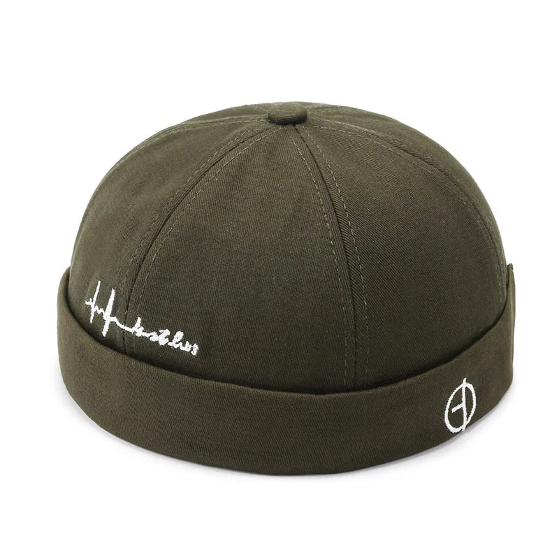 Olive green denim landlord hat docker with white embroidered logo and heartbeat script in rolled edge brimless style