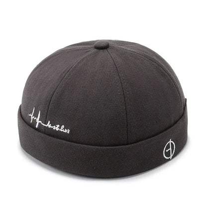 Dark gray textured fabric landlord hat docker cap with folded brim and white embroidered logo hip hop blue style