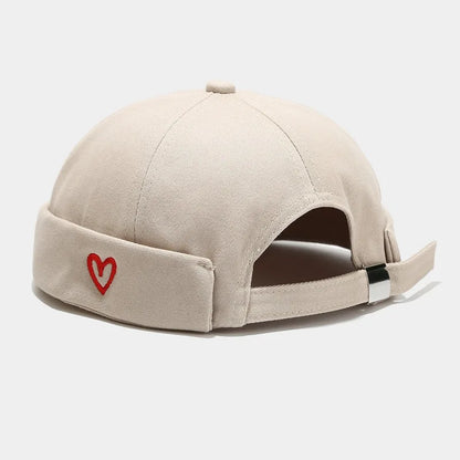 Beige hip hop blue washed cotton landlord cap with red embroidered heart on folded edge brimless sailor style