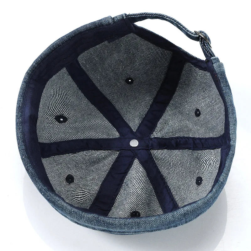 Denim-finished hip hop blue landlord hat docker with rolled edge brimless design and dark blue inner lining