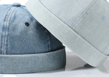 Light-wash denim hip hop blue landlord hat docker cap with folded brim and subtle stitching rolled edge brimless design