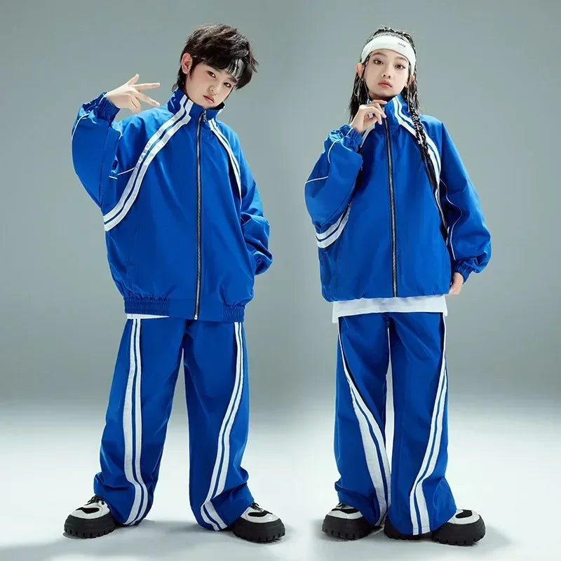 Blue athletic tracksuit for children featuring white side stripes with matching jacket and pants for casual sportswear