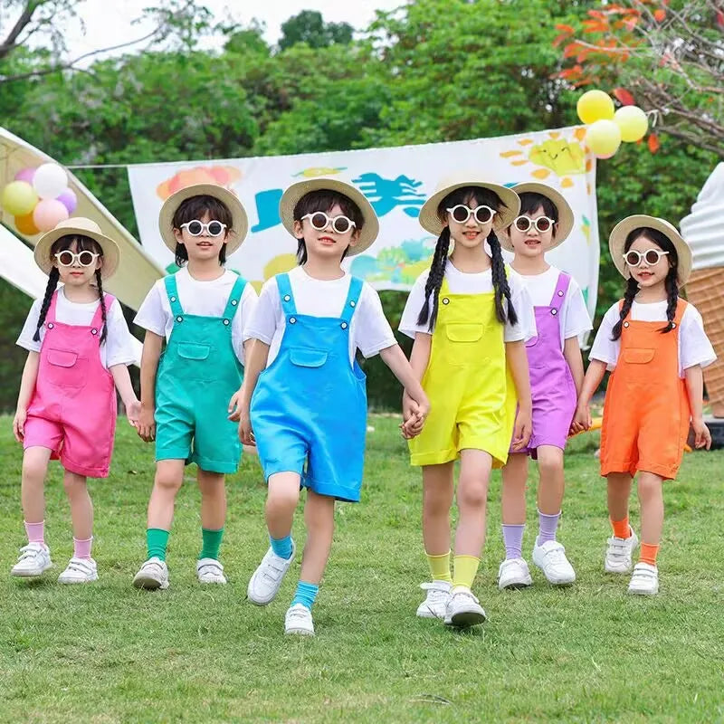 Children wearing hip hop children suspender shorts girls in candy color short dungaree overalls for streetwear