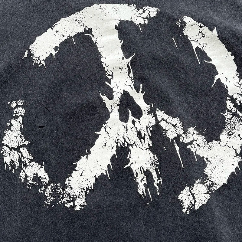 Black hip hop classic oversized damaged hole t-shirt with distressed white peace symbol logo print vintage design