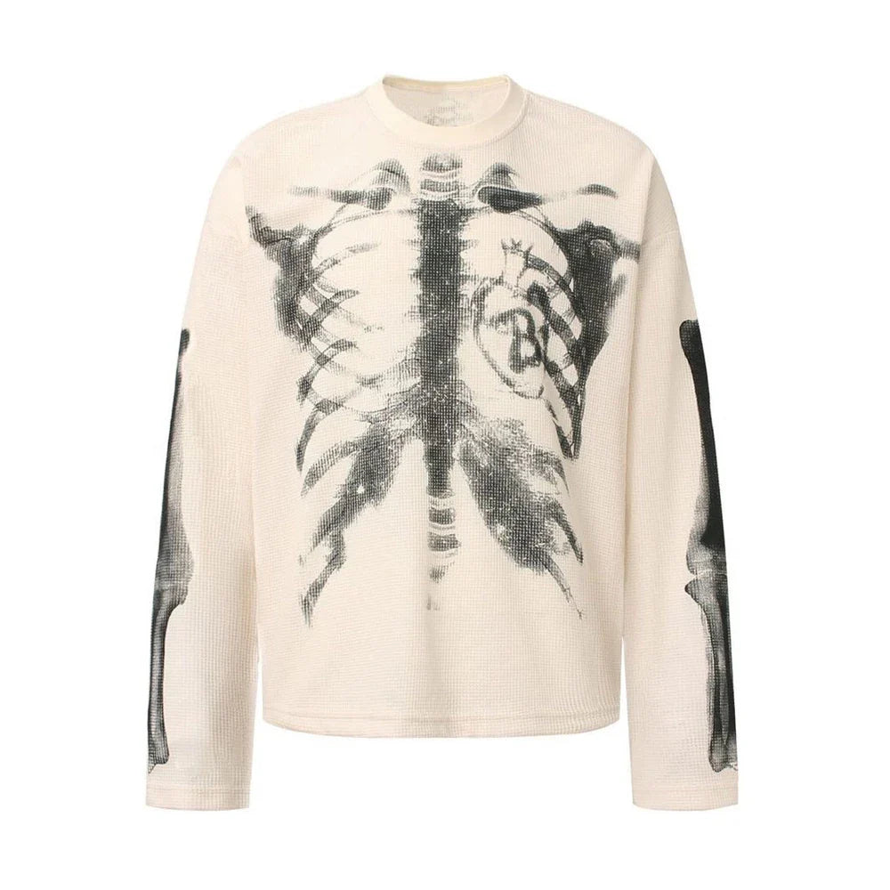 Cream-colored ribbed long-sleeve cotton sweatshirt with black skeletal x-ray print for hip-hop streetwear style