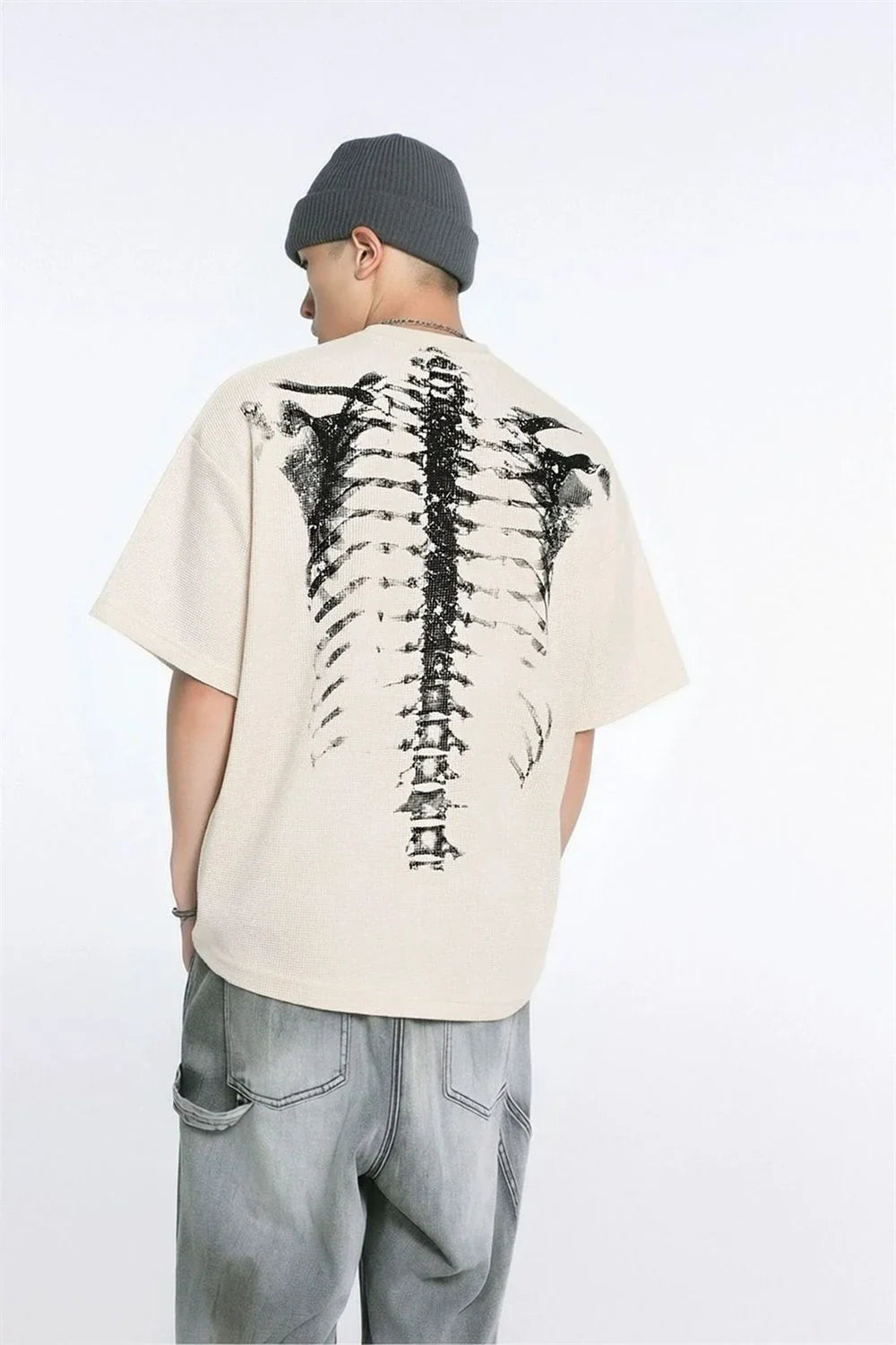 Beige cotton hip-hop creative print t-shirt with bold black skeletal ribcage graphic on the back for summer streetwear