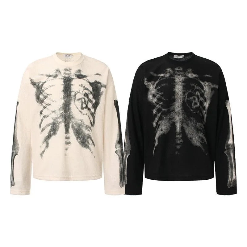 Two long-sleeved crewneck cotton sweatshirts in off-white and black with detailed skeletal ribcage and sleeve bone prints