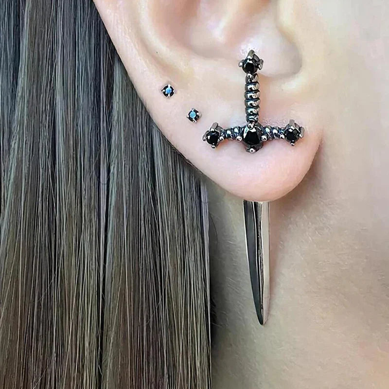 Black gemstone-encrusted hip hop cross sword stud earrings with classic blask crystal silver and black design