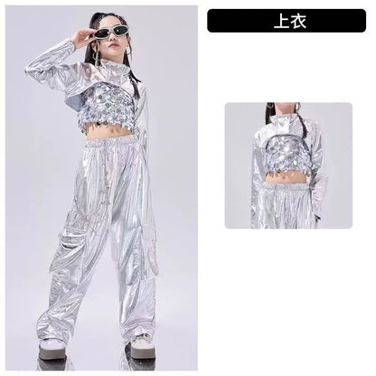 Shiny silver metallic crop top with high collar and embellished front panel for reflective rave outfit and jazz dancewear festival