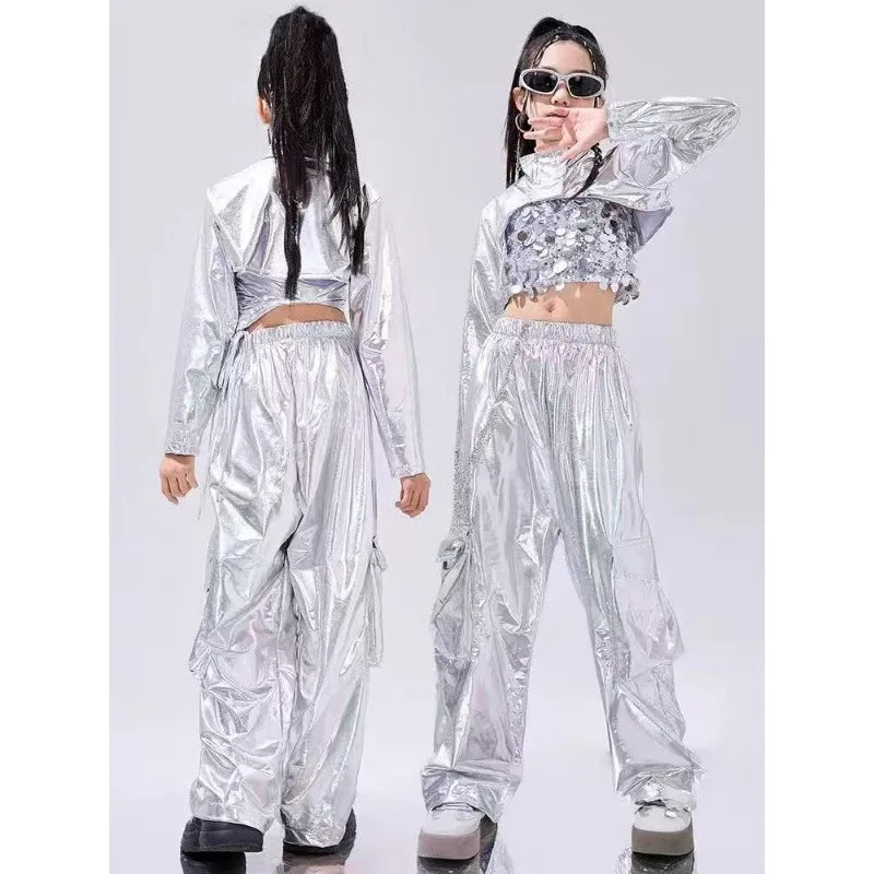 Shiny silver metallic two-piece dance outfit with reflective fabric and sequined crop top for jazz dancewear festival