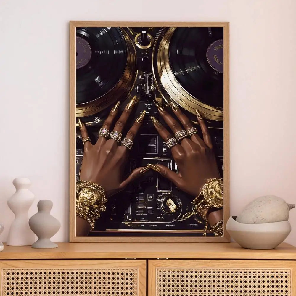 A framed art poster bar featuring black dj hand with gold nails and jewelry on turntables for hip hop fashion decor