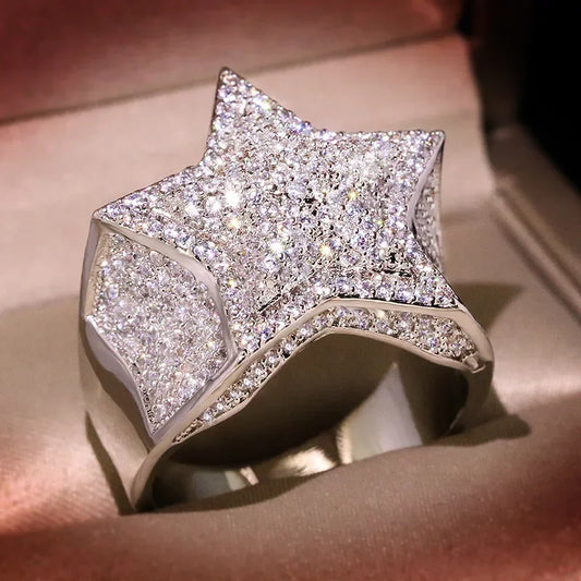 A dazzling hip hop five star ring with clear cubic zirconia on a polished silver-toned band for couple wedding rings