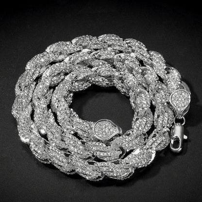 A sparkling silver hip hop round rope link chain necklace with thick braided design and austrian rhinestone paved crystals