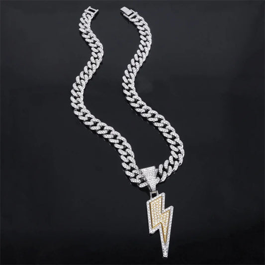 Silver and gold zircon lightning pendants necklace with purple cz zircon on an iced out miami cuban chain